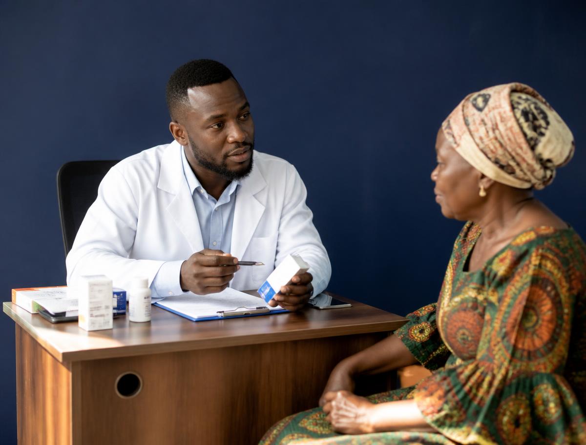 Pharmacist consulting with a customer